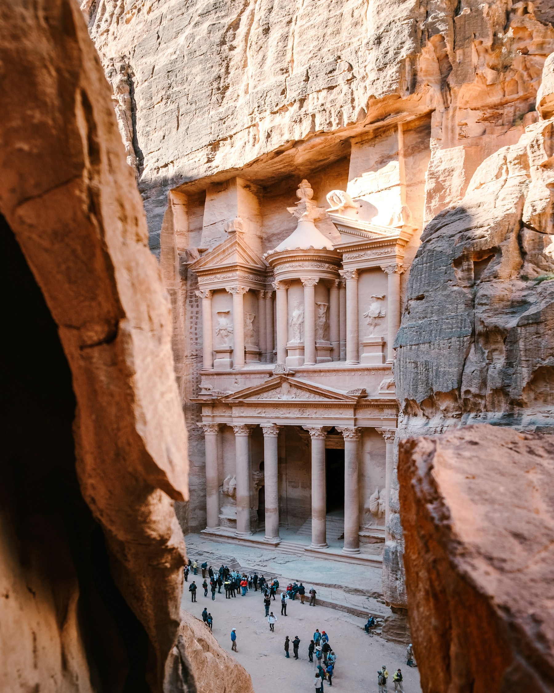 The Treasury carved into rose-colored sandstone at Petra, Jordan